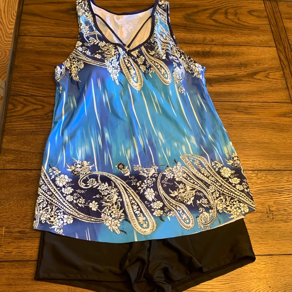 This is a blue women’s 3XL bathing suit- black short style bottoms to go with it